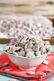Puppy chow is a snack mix made of crunchy chex cereal coated in a mixture of chocolate chips, peanut butter, butter, and vanilla which is covered in powered sugar. Easy Puppy Chow Aka Muddy Buddies Spend With Pennies