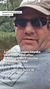Louisiana couple kayaks over their land after flooding from Francine turns  it into lake