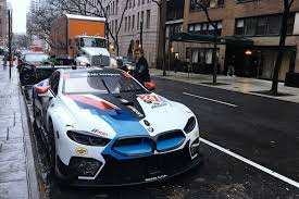alex zanardi rang the technology stock exchange nasdaq closing bell bmw super cars automotive design