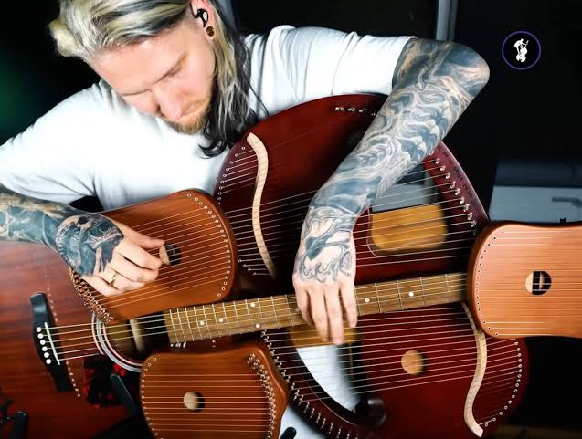 This guy built a 100 string acoustic guitar and it's an absolute game  changer… until you have to change the strings! - The Music Man