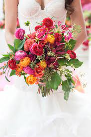 Your wedding is more than the food, photographs, and entertainment. Mexican Wedding Bouquets Florida Mexican Inspired Wedding Orange Bridal Bouquet Winter Wedding Bouquet