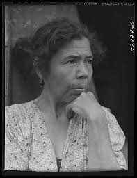 Utuado, Puerto Rico (vicinity). Farm laborer's wife who was being  interviewed for eligibility in FSA (Farm Security Administration)'s farm  labor program
