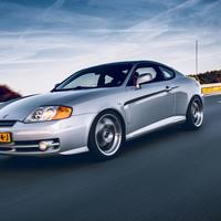 Image result for Pewter Silver 2003 Tiburon