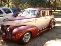 Image result for Trojan Maroon 1939 Oldsmobile