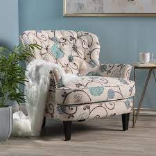 From plain fabric, to crushed velvet, to bright and bold floral patterns, we've got armchairs for everyone. Tari White And Blue Floral Fabric Club Chair