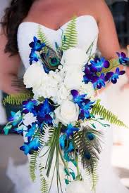 Beaded curtains, candle holders, arches, chandeliers Peacock Wedding Flower Arrangements