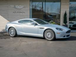 Image result for Titanium Silver 2011 Aston Martin
