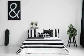 Although you may not think of darker colors like gray and black for a minimalist bedroom, paired with creamy whites the lack of color transforms this bedroom into a contemporary cozy minimalists dream. 123 Black And White Bedroom Ideas Inspiration Photo Post Home Decor Bliss