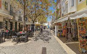 Nowadays düsseldorf's entertainment district with hundreds of pubs and restaurants, and proverbially known by germans as the longest bar in the world. Lagos Die Perle An Der Algarve