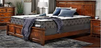 Queen sized metal bed frame on wheels. Denver Mattress Madison Plush Hybrid Mattress