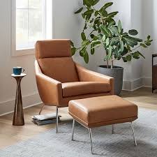 Ottomans can add storage and a footrest to chairs that do not recline. Austin Leather Armchair Ottoman Set
