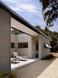Corrugated steel, for example, goes for around $5 to 8 per square foot. Facade Fix 9 Ways To Add Curb Appeal With Corrugated Metal Siding Gardenista Corrugated Metal Siding Metal Siding House Exterior