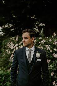 Garden Weddings This Groom Wore A Navy Suit Textured Gray Tie For An Elegant Look Image By C Groom Wedding Attire Groom Attire Wedding Outfit Men