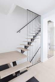 Kl Tz Design Renovates Light Filled Family Residence With Floating Staircase In Montreal Floating Staircase Stairs Design Interior Staircase Design