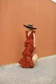 Blair Eadie Wearing A Johanna Ortiz Dress Eric Javits Hat And Carrying A Carolina Santo Domingo Straw Bag Johanna Ortiz Dresses Style Carolina Santo Domingo