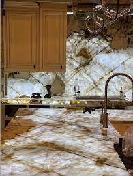 Uniquely patterned white granite kitchen countertop. Carmel Stone Imports Carmelimports Twitter