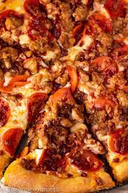 A delicious pizza recipe with a healthy base of millet and tapioca, topped with tomato sauce, cheese, pepperoni, chicken salami and salami milano. Meat Lovers Pizza Recipe Queenslee Appetit