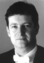 Archbishop Buechlein ordains five men to the priesthood