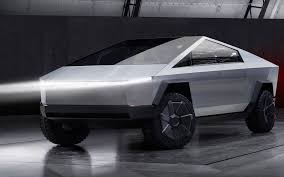 Tesla's cybertruck is a radical reimagining of a traditional pickup truck stainless steel body and wedge profile make it look like a movie prop tesla promises cybertruck deliveries in 2021 A More Normal Tesla Cybertruck Is Not Being Ruled Out The Car Guide