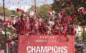 The liverpool team bus during the parade. Liverpool Celebrates Champions League Win With Bus Parade