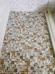 I am curious on what size of trowel and depth of thinset i should be placing. Home Dzine Bathrooms Install Glass Mosaics On Shower Floor