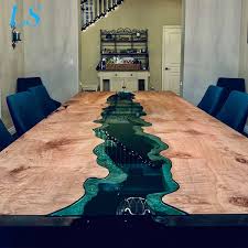 Use the squeegee to spread the epoxy evenly over the floor. China Diy Clear Wood Epoxy River Coffee Table Glow China Epoxy Resin Clear Epoxy Resin