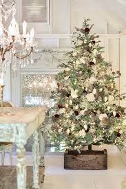 This silk floral arrangement has a ceramic vase that is gold on the lower half and enamel red on top. Summer Christmas Tree Decorating Ideas With Flowers