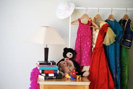 By hanging an outfit on a hanger, or folding it together. Jumble Sale Wikiwand