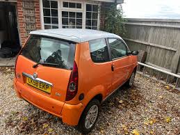 Image result for Orange 2007 Aixam-Mega