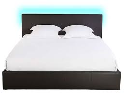 Le lit coffre propose un espace de rangement caché sous le sommier sans pour autant occuper un espace supplémentaire dans lit à led avec coffre de rangement similicuir blanc dina 140x190 cm. Lit Coffre 160x200 Cm Avec Led Steva Light Coloris Noir Vente De Lit Adulte Conforama