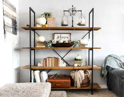 Floating shelves offer decorators plenty of accessorizing options. Living Room Shelf Ideas With Pumpkin Decorations For Fall