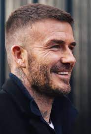 Latest hairstyles of david beckham short haircut with cool side part fades and tattoos on. Pin By Robert Sammarco On David Beckham Short Blonde Haircuts Mens Haircuts Short Blonde Haircuts