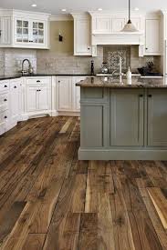 Laminate flooring usually just lays on the floor while wooden floorings often get glued. Vinyl Plank Wood Look Floor Versus Engineered Hardwood Hometalk