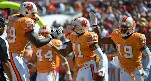 According to tampa sports history blog, this is the first iteration of the tampa bay buccaneers uniform, which apparently predates the eventual creamsicle uniforms that were ultimately chosen. Tampa Bay Bucs Announce New Rule Means No Creamsicle Throwback Uniforms Sporting News