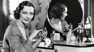 There is a side part with simple waves, then a decided curve over both cheeks. Adrienne Ames On Tumblr