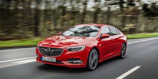 And blues, stripes sewn on the lower coat sleeves. 2017 Opel Insignia Grand Sport First Drive Review Car And Driver