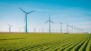 Wind turbines in a green field