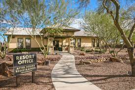 Owners have added lots of personal touches and upgrades to include paver driveway and paver driveway to rv gate, oversized tile on main living floor, custom paint and window. Cotton Lane Resort 55 Resort Community In Goodyear Az