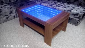 Beautiful wood grain, sculptural legs with gold painted feet and an opening with a center mirror. Infinity Mirror Coffee Table Self Made Youtube