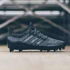 Black And Gold Youth Football Cleats The Adidas Ultraboost American Football Cleat Drops In Triple Black Soccerbible Adidas Ultrabo American Football Cleats Football Cleats American Football