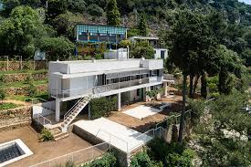Small gaps between their branches allow glimpses of the mediterranean below. The Sordid Saga Of Eileen Gray S Iconic E 1027 House