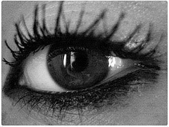 Kohl vs Kajal: close-up of an eye with bold black kajal makeup

