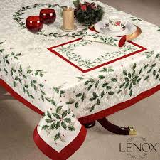 Keep Tradition Going With The Holiday Tablecloth By Lenox The Holly And Berry Motif Are Embel Holiday Table Linens Christmas Table Linen Christmas Table Cloth