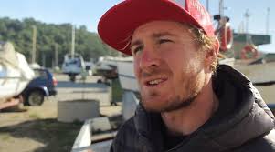 Andrew Cotton surfs 60ft down face of a wave at Praia do Norte beach in  Portugal