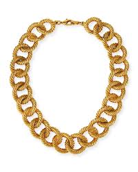 Gold, turquoise and amethyst long chain, designed as a line of turquoise beads alternating between 18ct gold rondels, accented at intervals with a faceted amethyst bead… 18 Chunky Gold Chain Choker Necklaces We Love