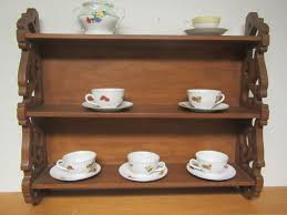 Shop online for porcelain, glass or stoneware sets and individual glasses. Wood Tea Cup And Saucer Wall Shelf Display Rack Wood Shelf Etsy Wood Shelves Wall Shelf Display Wall Shelves