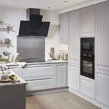 Wooden worktops and brass fixtures and fittings add warmth to the white colour scheme. Goodhome Garcinia Matt Stone Integrated Handle Shaker Highline Cabinet Door W 500mm T 20mm Diy At B Q