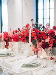 Floral centerpieces for weddings come in many different varieties. Contemporary Red Wedding Inspiration At West Edge In New York City Flower Centerpieces Wedding Wedding Floral Centerpieces Red Wedding Theme