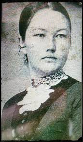 Having lunch with the Swedish/Finnish relatives in the market place in  Vassa, Finland 1958. Mom, in the chair with the red backing is wearing a  polka dot dress.