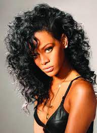 Rihanna Wearing Curly Wavy Hair Rihanna Hairstyles Curly Hair Styles Hair Styles
